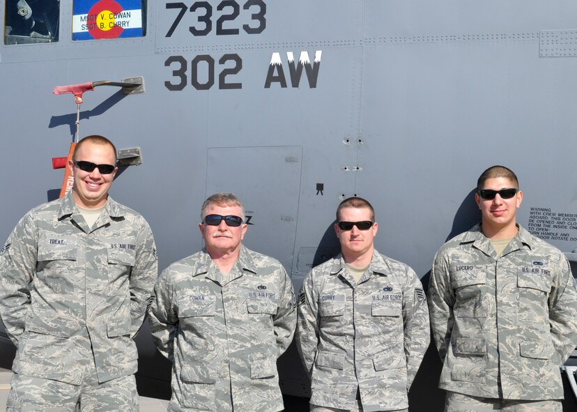 Left to right, Senior Airman Zachary Treat, assistant crew chief, 52nd Airlift Squadron, Master Sgt. Vic Cowan, dedicated crew chief, 302nd aircraft maintenance squadron, Staff Sgt. Brian Curry, DCC, 52nd Airlift Squadron, and Senior Airman Raymond Lucero, ACC, 302nd aircraft maintenance squadron, stand in front of their recently designated black-letter aircraft.  The other team members for aircraft 323 are Tech. Sgt. Scott Spencer, ACC, Senior Airman Richard Treatch, ACC, and Airman 1st Class Corey Kelty, ACC, all with the 302nd Maintenance Group. (U.S. Air Force photo/Tech. Sgt. Daniel Butterfield) 