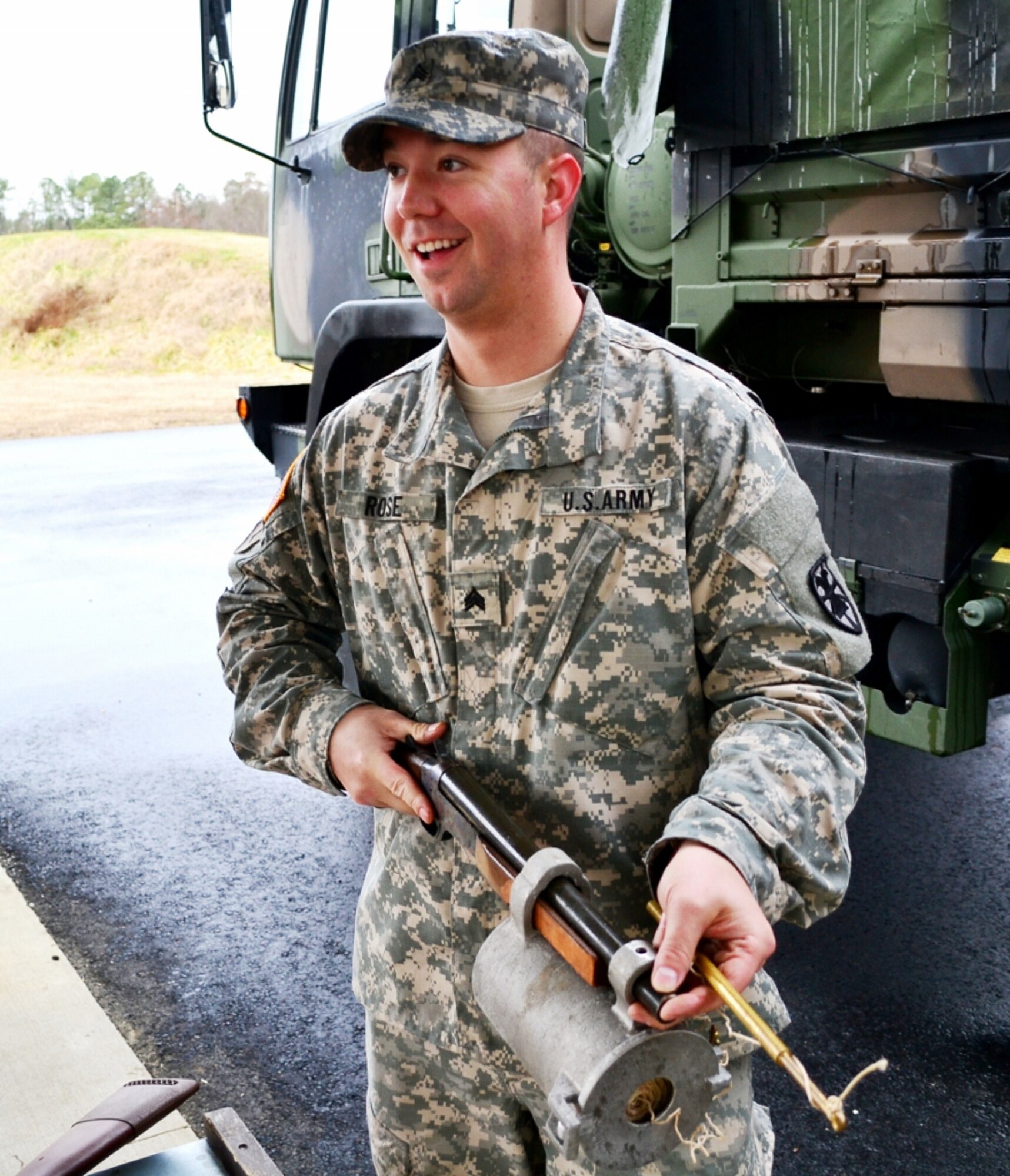 U.S. Army Sgt. Bryan Rose, a test firer assigned to the 97th Transportation Company, 10th Transportation Battalion, 7th Sustainment Brigade, poses with the Bridger Line Throwing Appliance prior to testing ammunition at Fort Eustis, Va., Feb. 13, 2013. Rose is part of a group of Soldiers that operates the post's Ammunition Supply Point, which allows military and local law enforcement units to train using live ammunition. (U.S. Army photo by Sgt. Edwin
Rodriguez/Released)
