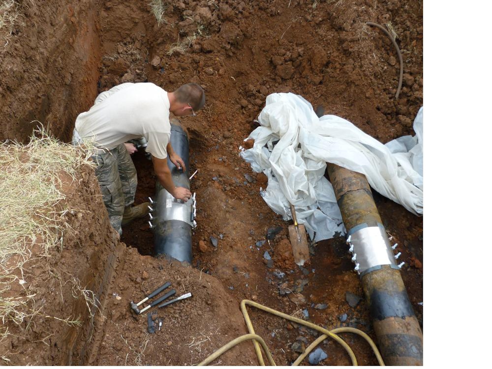 Airmen from the 7th Logistics Readiness Squadron perform repairs to underground fuel pipes recently at Dyess Air Force Base, Texas. The Dyess Air Force Base underground pipeline system was recently selected as U.S. Northern Command’s number one project to support and has projected funding of $11.5 million. The funding cycle is a five-year Program Objective Memorandum, which allows the Army Corps of Engineers to begin the project in Fiscal Year 2017. (Courtesy Photo)