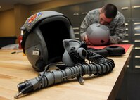 U.S. Air Force Senior Airman David Hainley, 23d Operations Support Squadron aircrew flight equipment technician, prepares pilots’ helmets for the installation of the Helmet Mounted Cueing System (HMCS) at Moody Air Force Base, Ga., Jan. 17, 2013. The HMCS, which will be fielded for the first time by 74th Fighter Squadron Airmen, will provide the latest tactical capabilities in aerial combat for the A-10C Thunderbolt II.  (U.S. Air Force photo by Senior Airman Eileen Meier/Released)