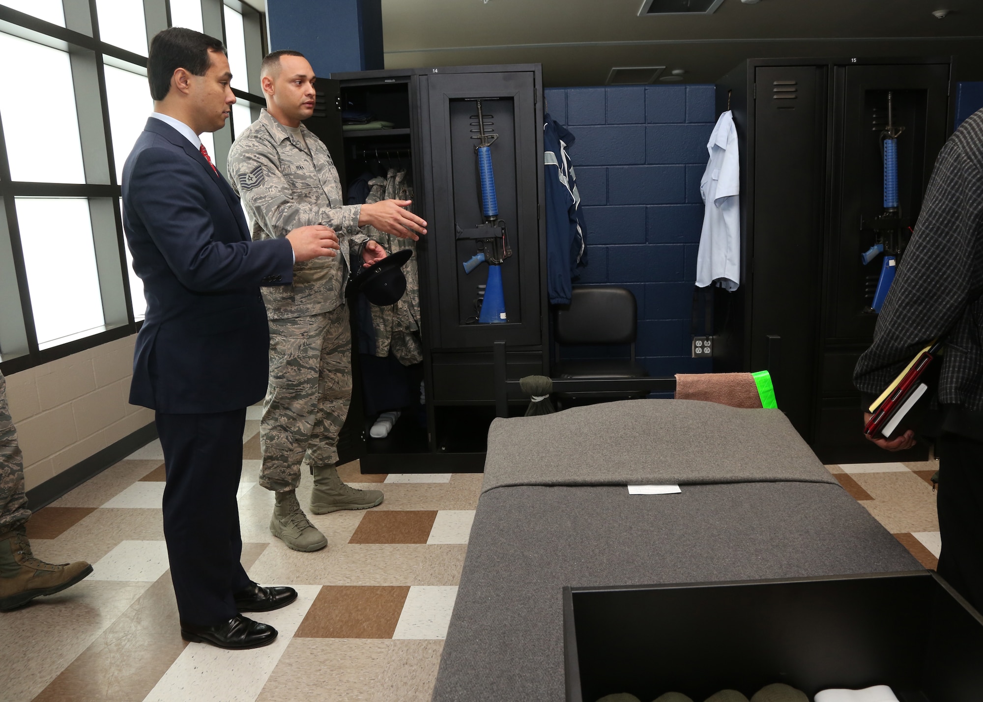 Congressman Joaquin Castro was shown the types of attention to detail expected of the trainees, including hospital corners on beds, evenly spaced hangars and perfectly rolled socks. Also highlighted were the new Airman Training Complex improved HVAC, latrine facilities and touchless canteen filling stations; all designed to reduce trainee illness and the spread of communicable diseases. (U.S. Air Force Photo/Robbin Cresswell)