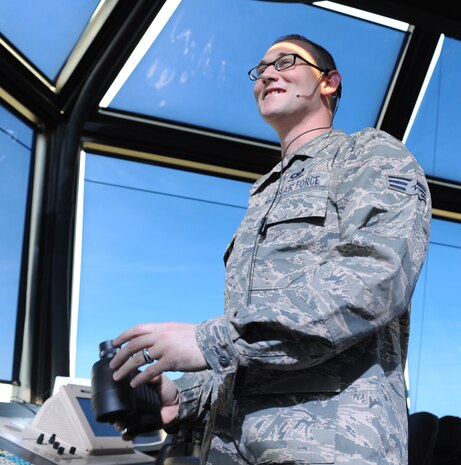 Senior Airman Andrew Groff, 9th Operation Support Squadron air traffic controller, overlooks the flightline from the tower on Beale Air Force Base, Calif., Feb. 20, 2013.  Groff is the 12th Air Force Outstanding Performer of the Year in the Airman Category. (U.S. Air Force photo by Airman 1st Class Bobby Cummings/Released)