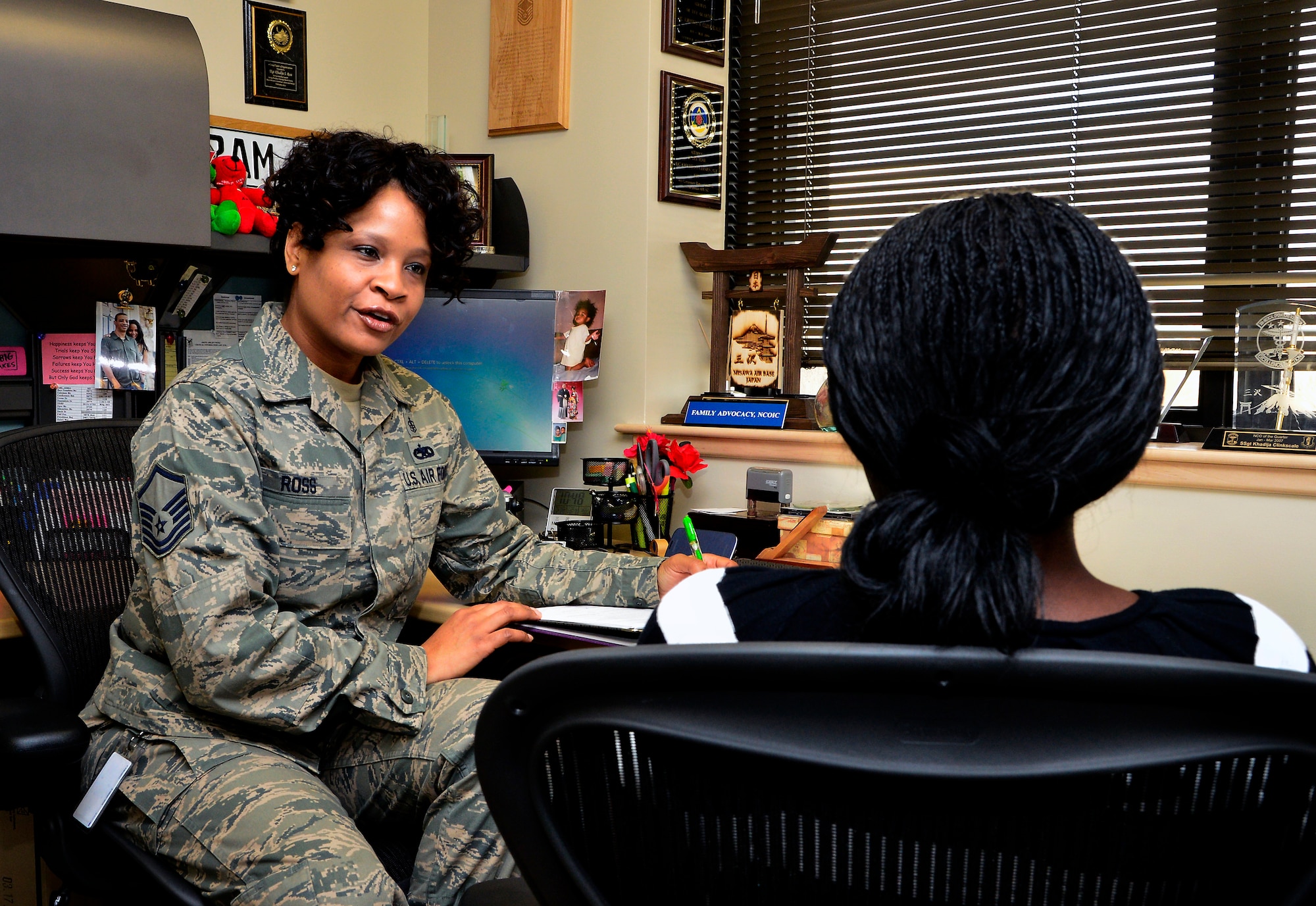 Master Sgt. Khadija Ross interviews a patient seeking care Feb. 20, 2013 at the Mental Health Clinic on Dover Air Force Base, Dover Del. Interviewing patients is part of Ross' duties. Ross was the 2102 Air Mobility Command award winner of the United States Air Force Outstanding Mental Health Noncommissioned Officer of the Year. (U.S. Air Force photo/David S. Tucker)

