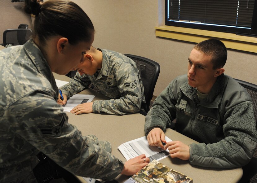 WHITEMAN AIR FORCE BASE, Mo. – Airman 1st Class Lacie Carmody, 509th Bomb Wing Public Affairs broadcaster, reviews a resiliency training worksheet with Airman 1st Class Justin Rye, 509th Maintenance Squadron egress systems apprentice, during the First Term Airman’s Course, Feb. 14. The FTAC Airmen were given an 8-hour long comprehensive resilience training designed to strengthen overall well-being.  (U.S Air Force photo/Airman 1st Class Bryan Crane)