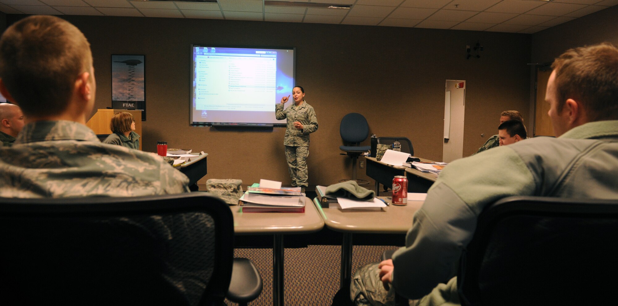 WHITEMAN AIR FORCE BASE, Mo. – Airman 1st Class Lacie Carmody, 509th Bomb Wing Public Affairs broadcaster, reviews slides with the First Term Airmen’s Course, Feb. 14. This new MRT course will now be given to all Whiteman FTAC classes. (U.S Air Force photo/Airman 1st Class Bryan Crane)