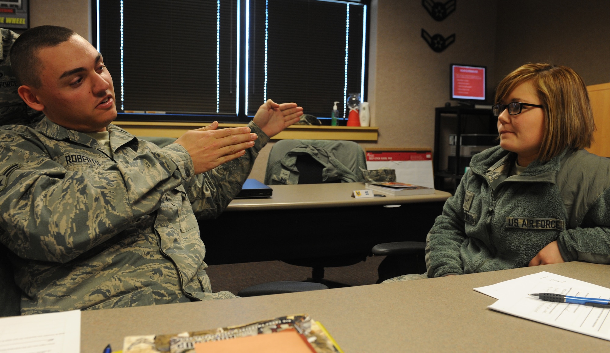 WHITEMAN AIR FORCE BASE, Mo. -- Airman 1st Class Matthew Roberts, 509th Maintenance Squadron egress systems apprentice, discusses his way of dealing with problems with Airman 1st Class Tanya Pettis, 509th Aircraft Maintenance Squadron aircraft armament systems technician, during the new comprehensive resilience training, Feb. 13. The MRT course was adapted from the University of Pennsylvania’s Positive Psychology program, and is intended to create a positive work environment. (U.S Air Force photo/Airman 1st Class Bryan Crane) (Released)