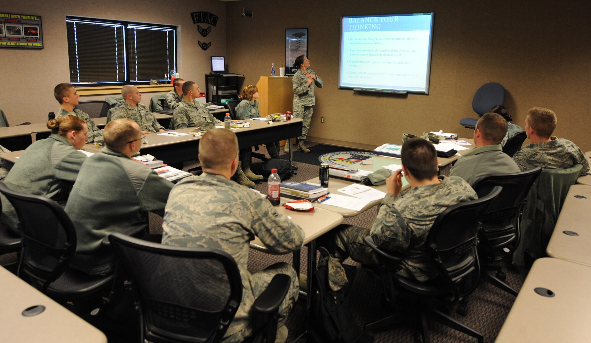 WHITEMAN AIR FORCE BASE, Mo. -- Airman 1st Class Lacie Carmody, 509th Bomb Wing Public Affairs broadcaster, provides Airmen with the new comprehensive resilience training during the First Term Airmen’s Course, Feb. 13. This was the first FTAC class to receive the new resiliency course.  (U.S Air Force photo/Airman 1st Class Bryan Crane) (Released) 