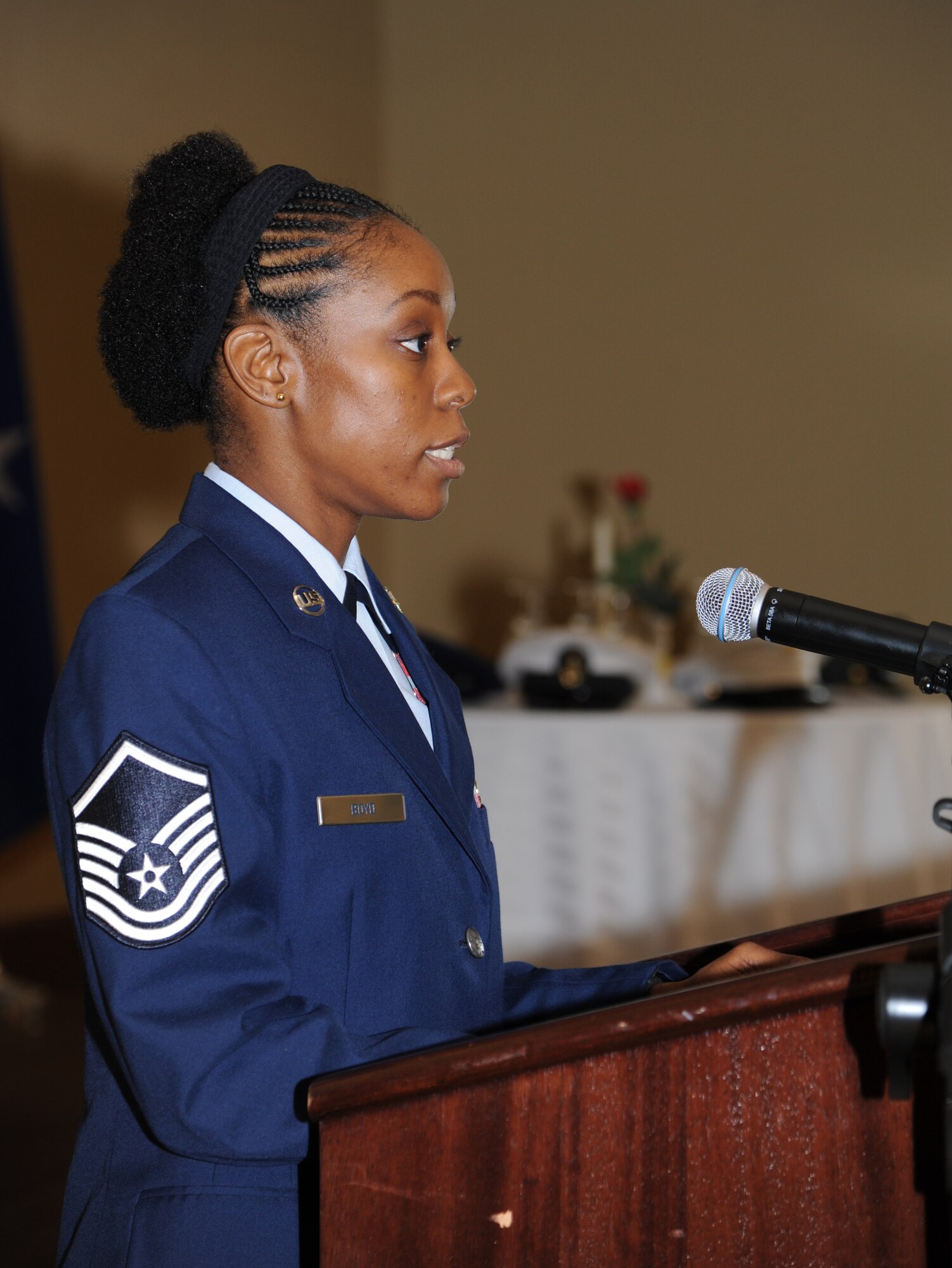 Master Sgt. Tanya Boyd, 81st Training Wing, reads a Christian scripture at the National Prayer Luncheon Feb. 20, 2013, at the Bay Breeze Event Center, Keesler Air Force Base, Miss.  The event included a ceremony by the Keesler Honor Guard to honor prisoners of war and those missing in action and guest speaker, retired Col. Richard Toliver.  The annual event, a tradition that stems back to President Dwight D. Eisenhower in 1953, allows individuals of different faiths and backgrounds to join together to reflect and develop their spiritual fitness. This year’s theme was “Pray for America.”  (U.S. Air Force photo by Kemberly Groue)