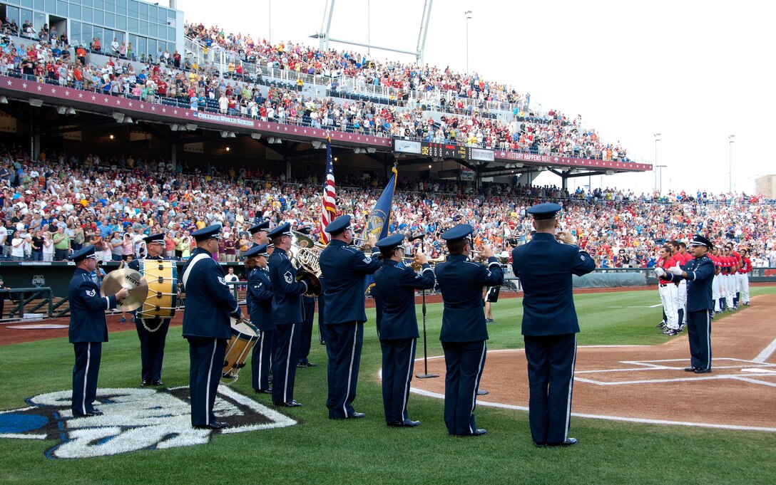 Brass in Blue, led by First Lieutenant Rafael Toro-Quiñones, performs the National Anthem for the College World Series in Omaha, NE