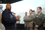 A reconfigurable virtual tactical trainer instructor gives a safety brief and weapons demonstration to 558th Flying Training Squadron students at Joint Base San Antonio-Camp Bullis, Texas Feb. 8, 2013. The students spent the day learning about convoys, urban tactical procedures and improvised explosive devices to get a taste of what ground troops experience during combat. (U.S. Air Force Photo by Capt. Ashley Walker)