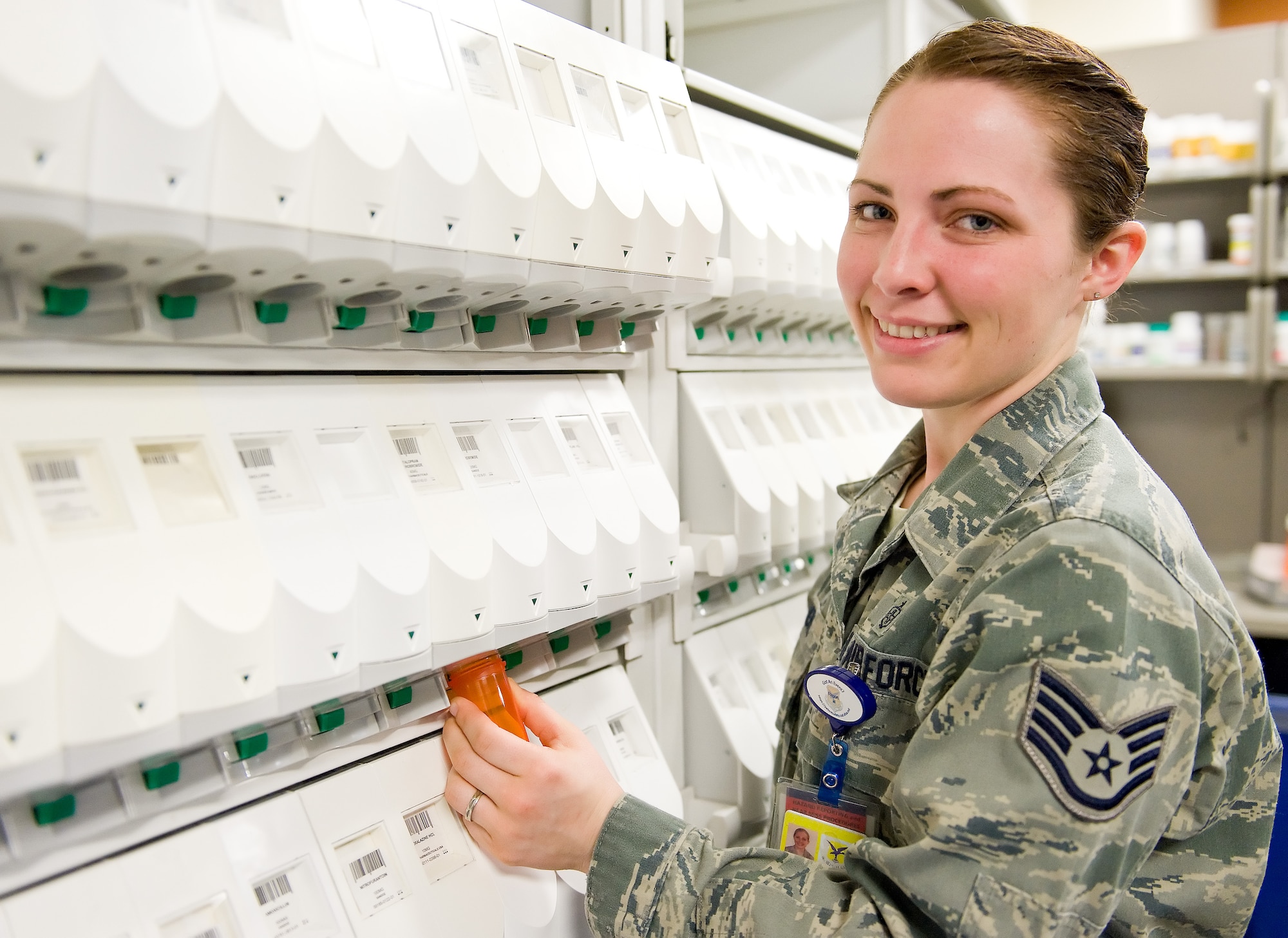Staff Sgt. Cassandra Saphore, a certified pharmacy technician with the 436th Medical Support Squadron, poses for a work place photo Feb. 20, 2013, at Dover Air Force Base, Del., Dover AFB Clinic Laboratory. Saphore was the 2012 Air Mobility Command award winner of the Outstanding Pharmacy Noncommissioned Officer Technician of the Year. (U.S. Air Force photo/Roland Balik)
