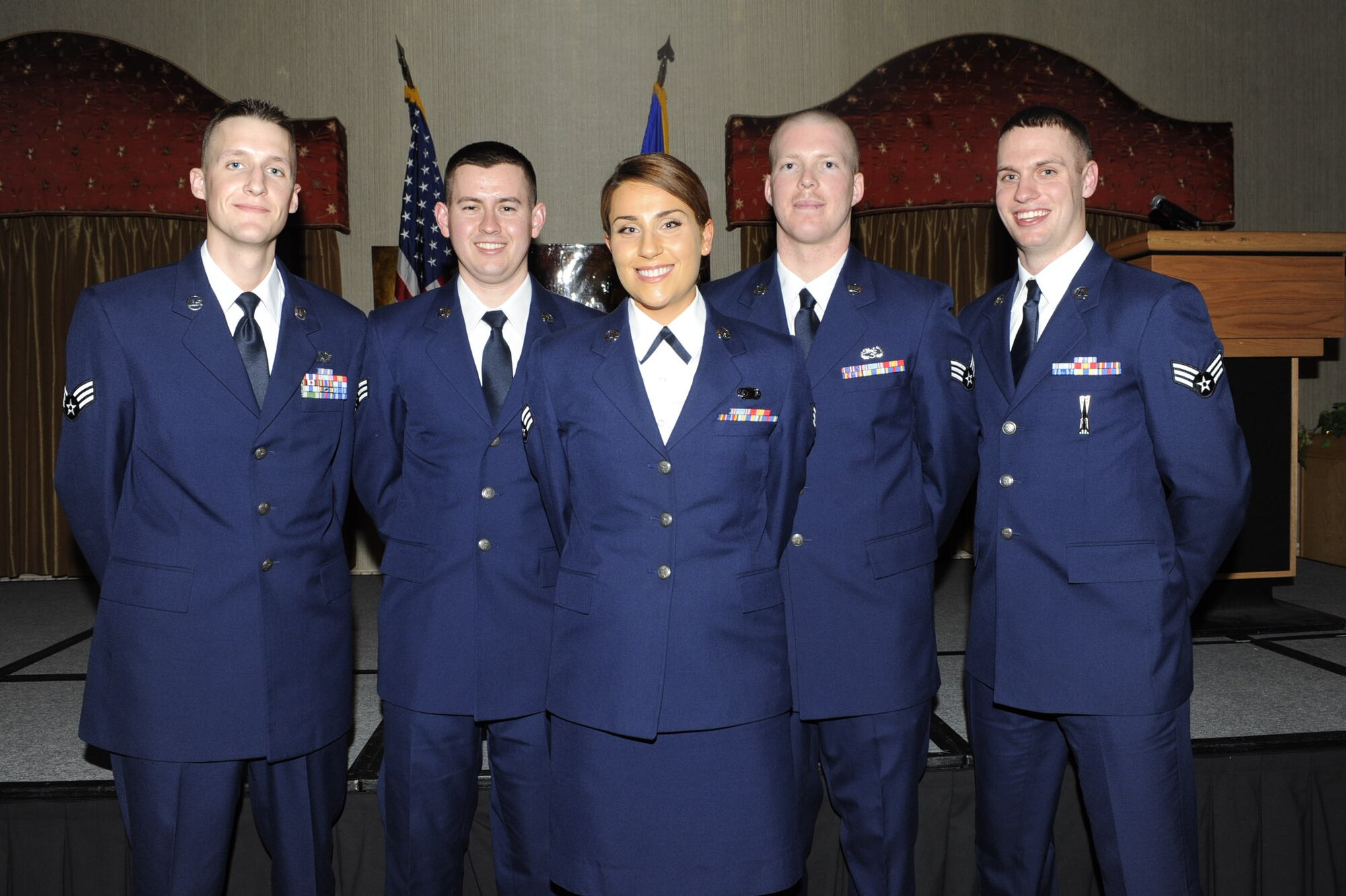 MINOT AIR FORCE BASE, N.D.  – The Airman Leadership School Class 13-C graduated with 46 students during a ceremony held at the Jimmy Doolittle Center here, Feb. 13. Congratulations to the graduates and special recognition to the following award winners: Commandant's Award: Senior Airman Jake Dugat, 91st Missile Maintenance Squadron; Academic Achievement Award: Senior Airman John Rasband, 705th Munitions Squadron; Distinguished Graduate Awards: Senior Airman Trevor Fouty, 5th Maintenance Squadron, Senior Airman Ryan Wilkinson, 91st MMXS; Senior Airman  Jake Dugat, 91st MMXS; Senior Airman John Rasband, 705th Munitions Squadron; John L. Levitow Award:  Senior Airman Jessica Haas, 5th Bomb Wing Public Affairs. Pictured here from left to right are:  Senior Airmen Fouty, Wilkinson, Haas, Rasband and Dugat. (U.S. Air Force photo/Airman 1st Class Stephanie Ashley)