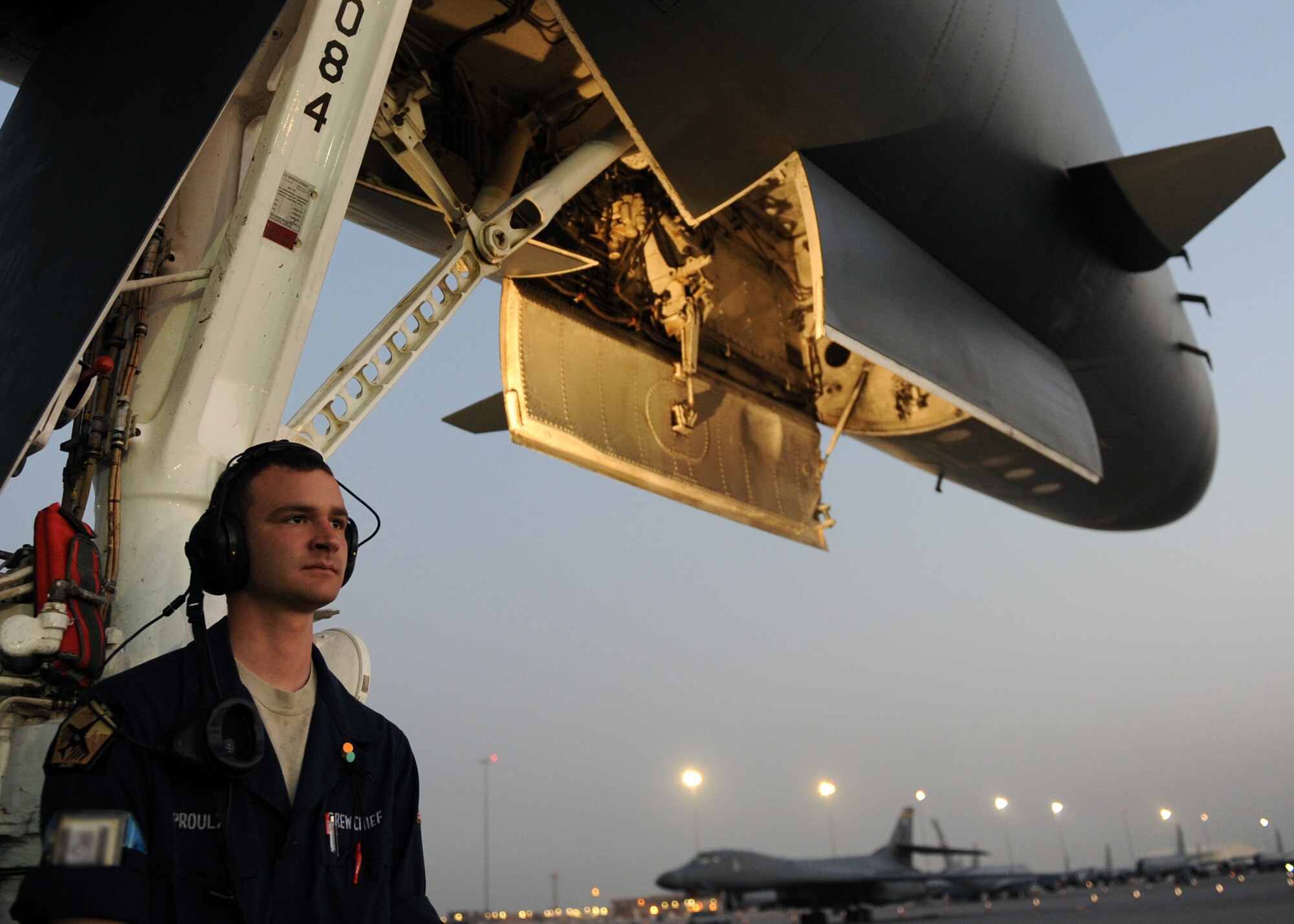 SOUTHWEST ASIA – Senior Airman Korey Proulx, 34th Expeditionary Aircraft Maintenance Unit B-1B crew chief, waits as 34th Expeditionary Bomb Squadron aircrew go over pre-flight checks Feb. 21. Proulx is deployed from the 28th Aircraft Maintenance Squadron at Ellsworth Air Force Base, S.D. (U.S. Air Force photo/Senior Airman Joel Mease)