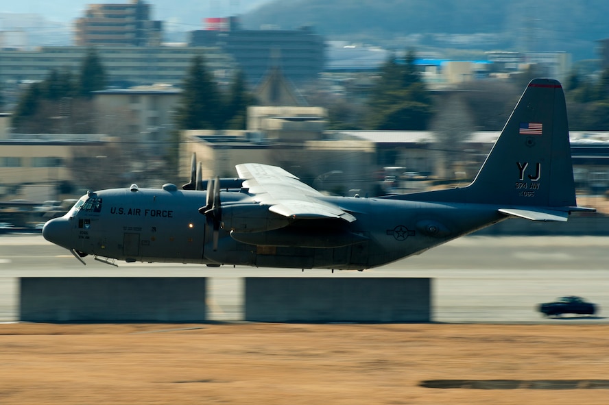 YOKOTA AIR BASE, Japan-- A C-130 Hercules takes off from Yokota Air Base, Japan, Feb. 21, 2013. Six C-130s participated in a flight formation to practice airlift tactics and procedures. (U.S. Air Force photo by Airman 1st Class Meagan Schutter)