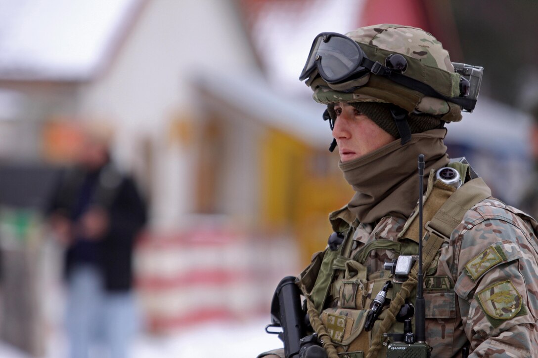 A Soldier assigned to Georgian Armed Forces, 42nd Battalion patrols through a simulated village a cordon and search exercise, recently in Hohenfels, Germany. These soldiers are completing their mission readiness exercise as the final event of the latest rotation of the Georgia Deployment Program-International Security Assistance Force hosted and executed by Marine Forces, Europe, Marine Corps Security Cooperation Group and U.S. Army soldiers stationed at the Joint-Multinational Readiness Center in Hohenfels, Germany. The GDP-I was started in 2009 to provide security cooperation training to the GAF in preparation for their deployments to Afghanistan where they are responsible for their own area of responsibility and work closely with U.S. Marines in the region. 