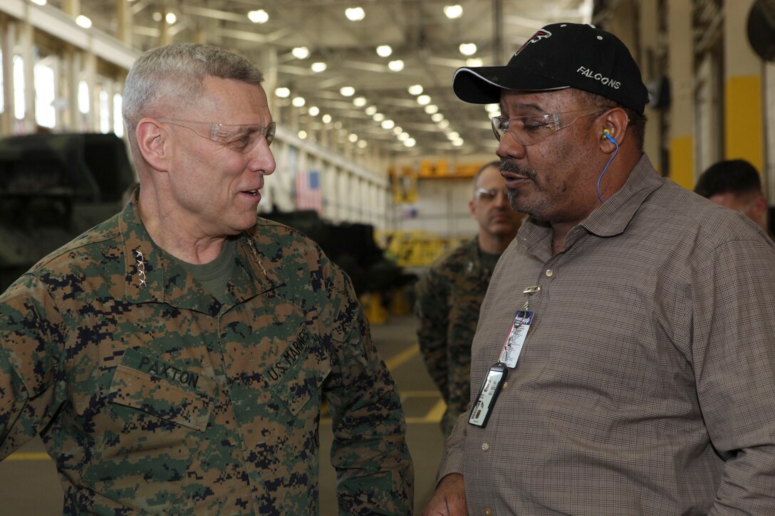 The Assistant Commandant of the Marine Corps, Gen. John M. Paxton, Jr., speaks with personal, during a visit to Marine Corps Logistics Command, Albany, GA,  Feb. 21, 2013. The trip was part of a larger visit with Marines aboard installations under Marine Corps Logistics Command (LOGCOM) and Marine Corps Systems Command. (U.S. Marine Corps photo by Cpl. Tia Dufour/Released)