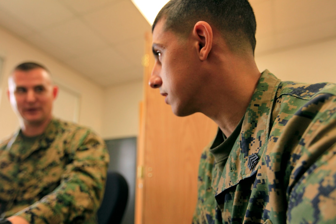 Sgt. Ricardo D. Torres, an aviation intermediate level structures mechanic with Headquarters and Headquarters Squadron here, listens to career advice given to him from Gunnery Sgt. Jeremy L. Hammock, a Manpower Management Support Branch–50 career counselor. Marines attending Sergeant’s Course received one-on-one occupational guidance to improve their chances for promotion during a visit from MMSB–50 here Feb. 19 - 21.