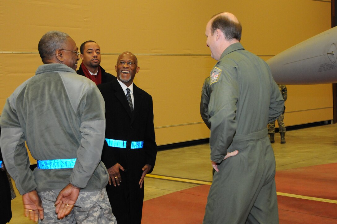 Deputy Mayor for Public Safety and Justice for District of Columbia, Paul A. Quander, Jr. talks with Major General Errol R. Schwartz, Commanding General, Joint Force Headquarters, District of Columbia National Guard during a tour of the 113th Wing, Joint Base Andrews, Md. on February 22, 2013. The tour help the Deputy Mayor learn more about the 113th Wing personnel and its mission.(U.S. Air Force Photo by A1C Sumeana Leslie/Released)