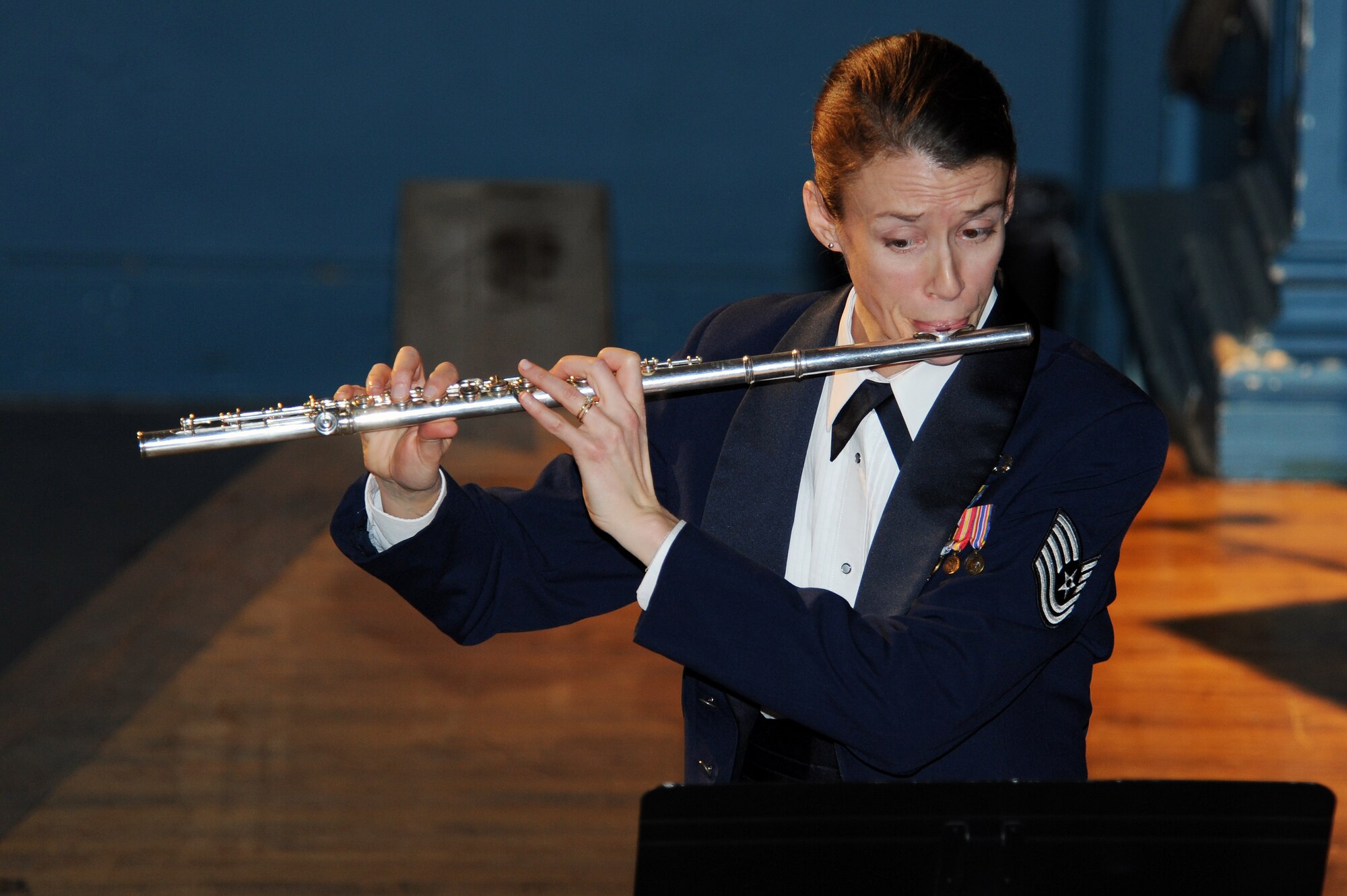U.S. Air Force Tech. Sgt. Anne Epperly, member of the U.S. Air Force Heritage of America’s Langley Winds, plays the flute during a live concert at Goldsboro High School, Goldsboro, N.C., Feb. 16, 2013. The Joint Base Langley-Eustis band performed more than five musical arrangements for members of the Goldsboro High community. (U.S. Air Force photo/Airman 1st Class John Nieves Camacho/Released)