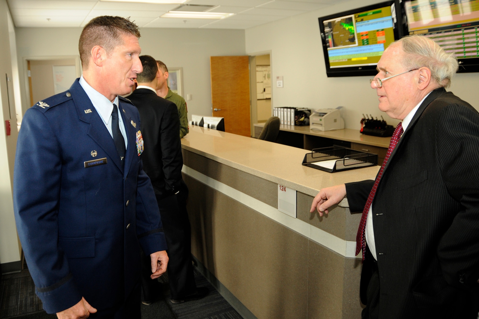 Following a ribbon cutting ceremony, Colonel Douglas Champagne, 127th Operations Group commander, gives Senator Carl Levin (D-Mich.) a tour of the new Operations Facility, Building 34, on February 22 at Selfridge Air National Guard Base. The building hosts the Operations Group command staff, the 107th Fighter Squadron and the 127th Operations Support Flight.  (photo by John S. Swanson)