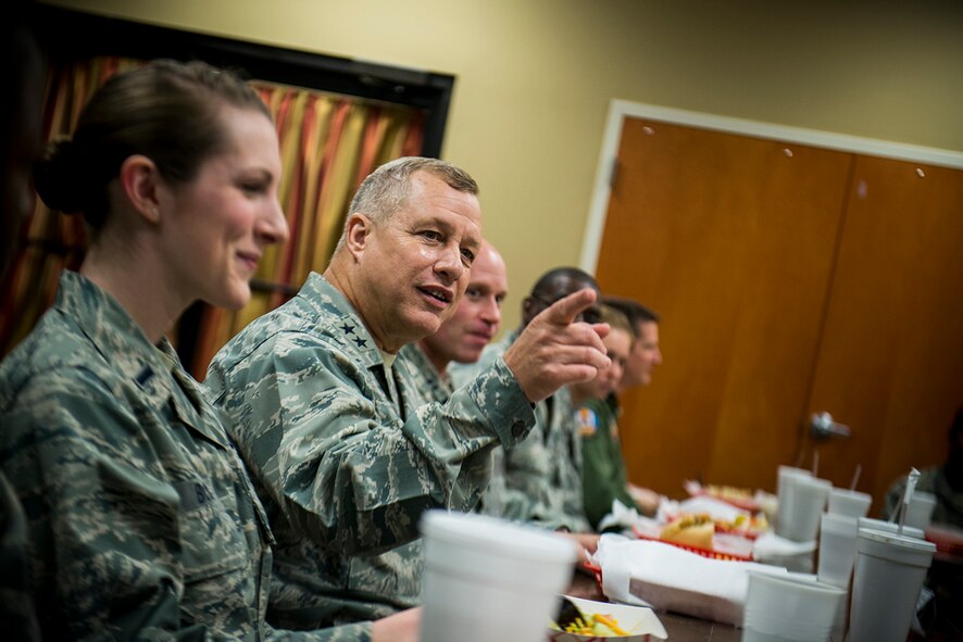 U.S. Air Force Maj. Gen. Lawrence Wells, 9th Air Force commander, speaks with company-grade officers during lunch Feb. 20, 2013, at Moody Air Force Base, Ga. The officers represented a wide-range of career fields and specialties at Moody, giving Wells a better understanding of what's happening on base. (U.S. Air Force photo by Staff Sgt. Jamal D. Sutter/Released)