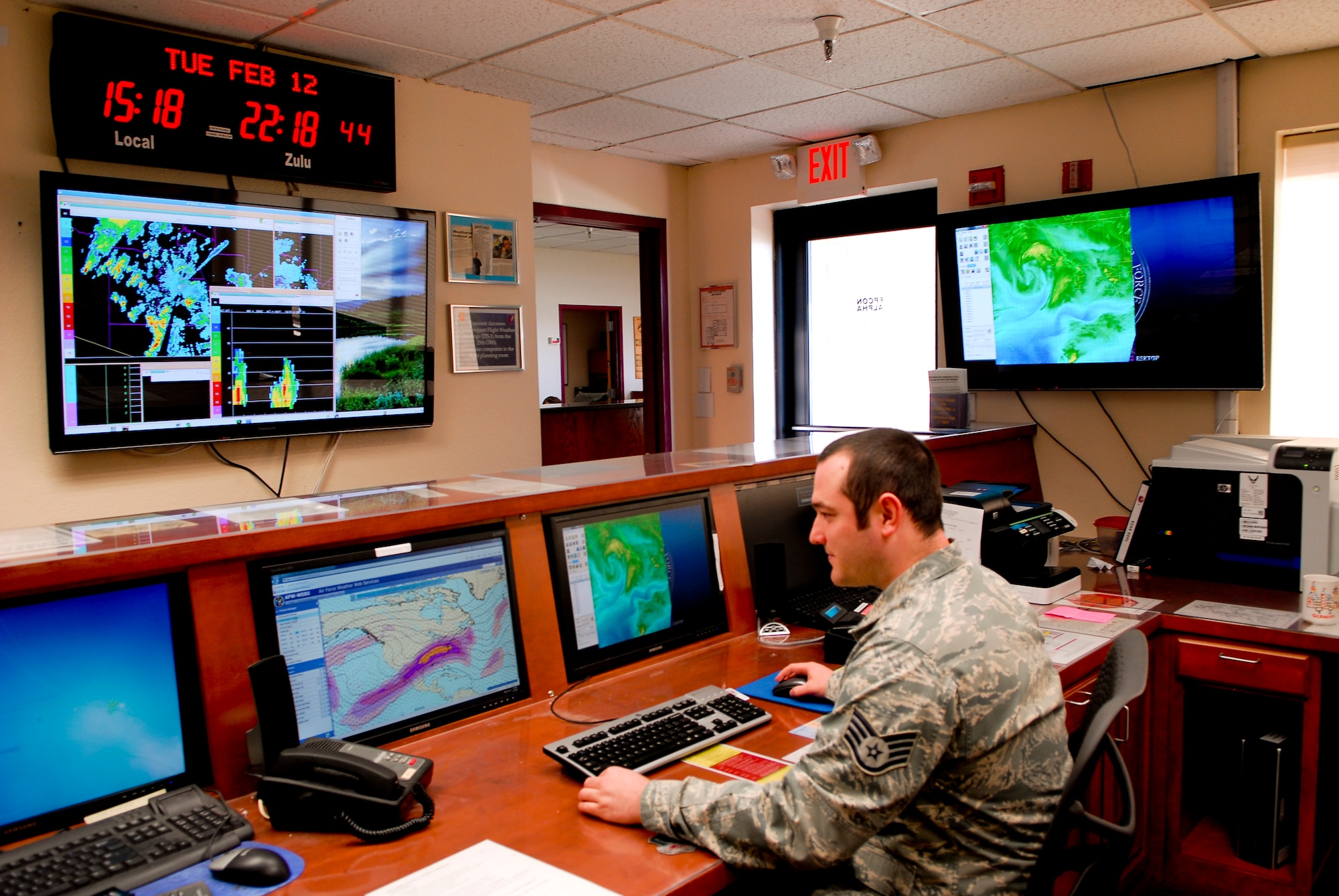 Staff Sgt. Jerry Conley, 56th Operations Support Squadron Weather Flight forecaster, checks forecasts of the local area Feb. 12 at the base operations building on Luke Air Force Base. The weather section helps keep Luke’s pilots safe by providing up-to-date information about the weather and potential hazards that may occur. (U.S. Air Force photo/Airman 1st Class Grace Lee)