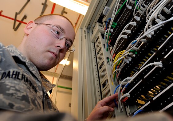 Airman 1st Class Matthew Dahlhauser, 39th Communications Squadron cyber transport technician, checks cables on an Ethernet port switch Feb. 22, 2013, at Incirlik Air Base, Turkey. The 39th CS provides communications support for the entire NATO-led Patriot battery deployment to Turkey. Throughout the deployment, members of the squadron will maintain the communication lines for more than 400 U.S. Army service members stationed in locations around Turkey. (U.S. Air Force photo by Staff Sgt. Marissa Tucker/Released)