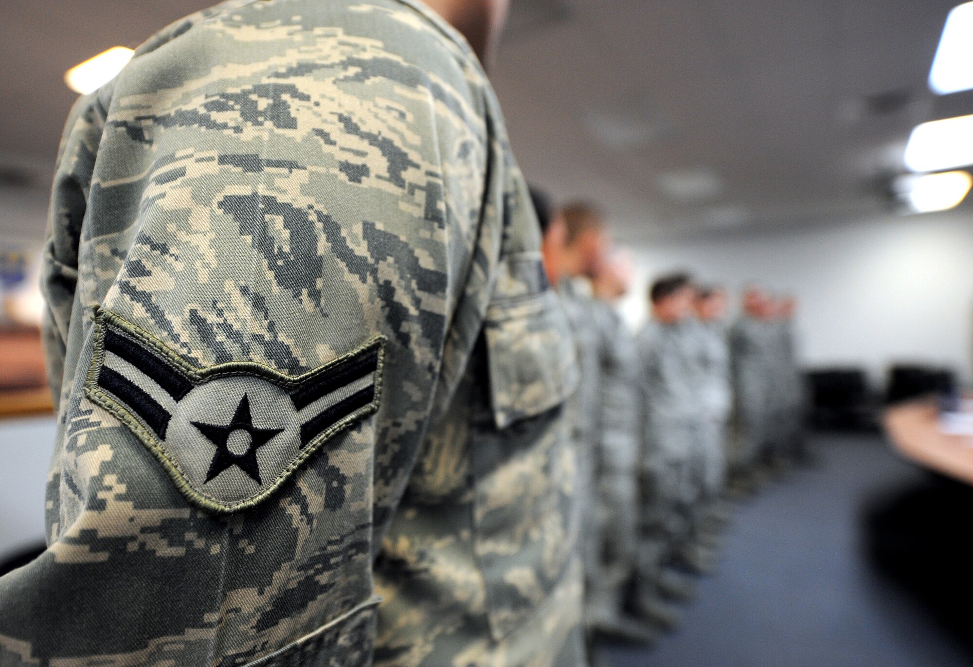 Airmen stand before a senior noncommissioned officer panel to share their leadership style during the ?Continue to Rise: Arise as a Leader? Airman development seminar Feb. 12 in the conference room in Bldg. 3080. Airmen were broken into three teams and charged with developing their own leadership style to be presented to the panel. (U.S. Air Force photo/Staff Sgt. R.J. Biermann) 