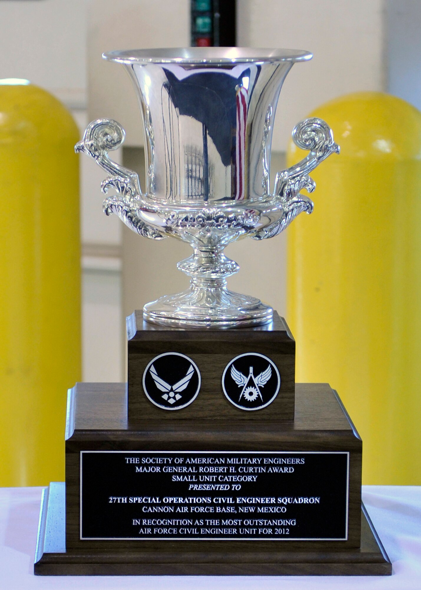 The Air Force Outstanding Civil Engineer Unit Award was recently presented to the 27th Special Operations Civil Engineer Squadron at Cannon Air Force Base, N.M., Feb. 11, 2013. The 27 SOCES is credited in executing the largest military contracting program for 2012, estimated at $1.29 billion. (U.S. Air Force photo/Senior Airman James Bell) 
