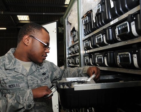 Airman 1st Class Leigh Nobles, 100th Logistics Readiness Squadron Mobility Readiness Spares Package apprentice from Vanceboro, N.C., inventories equipment Feb. 19, 2013, at RAF Mildenhall, England. The section’s primary responsibility is to make sure critical spares, repair parts and related maintenance supplies are mission-ready. They are required to sustain a weapons system for a specified period during wartime or contingency operations. (U.S. Air Force photo by Gina Randall/Released)