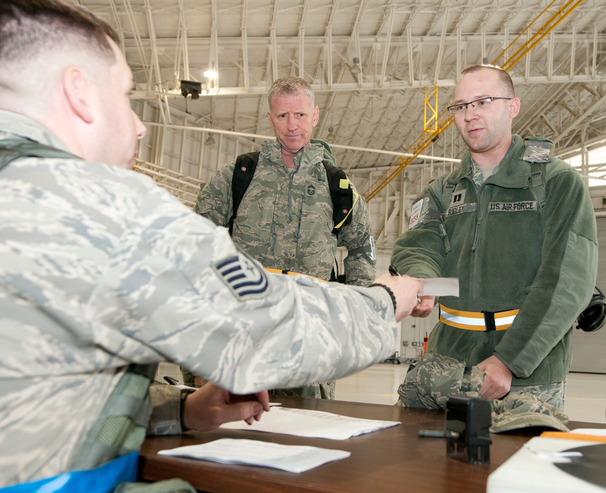 Capt. Rusty S.E. Ridley, a member of the 153rd Airlift Wing Air National Guard, inprocesses with Personnel Flight during an Operational Readiness Exercise, at the Mississippi Air National Guard's Combat Readiness Training Center Gulfport in Gulfport, Miss. The 134th AEW is comprised of four units: the 153rd Airlift Wing, the 130th Airlift Wing, the 375th Air Mobility Wing and the 11th Wing. The exercise assesses the abilities of the individual units to deploy forces, quickly respond and recover assets during a week-long exercise conducted and graded by an Exercise Evaluation Team. (U.S. Air Force Photo by Tech. Sgt. Bryan G. Stevens/Released)