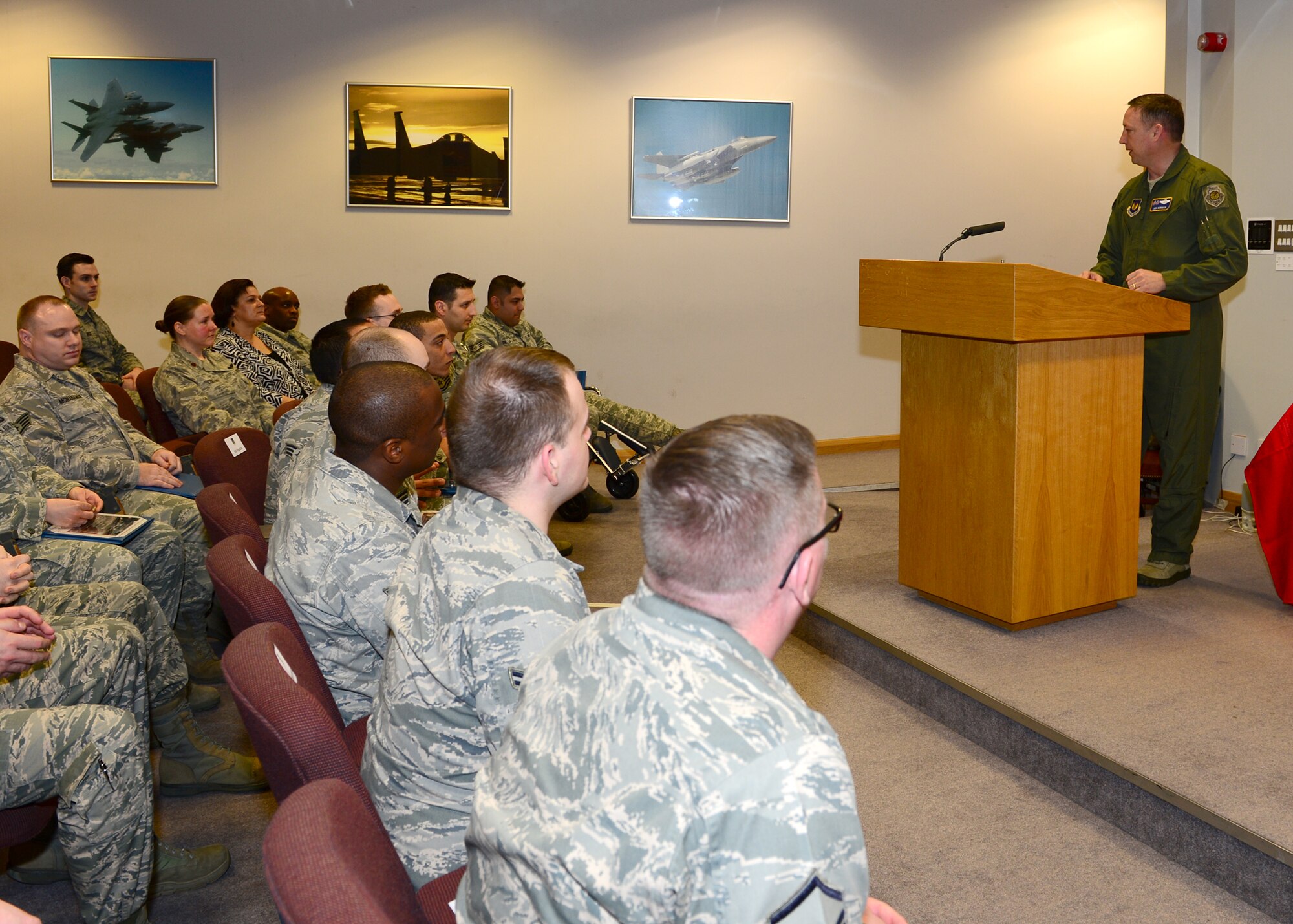 Brig. Gen. Jon Norman, Director to U.S. Air Forces in Europe-United Kingdom, thanks the Airmen from the 48th Fighter Wing and 100th Air Refueling Wing for their service and offers words of encouragement during the New Horizons Wounded Warrior Support Program graduation ceremony Feb. 19, 2013, at the Strike Eagle Complex, RAF Lakenheath, England. Norman presented certificates and coins to 14 graduates from the program.  (U.S. Air Force photo by Staff Sgt. Stephanie Mancha/Released)