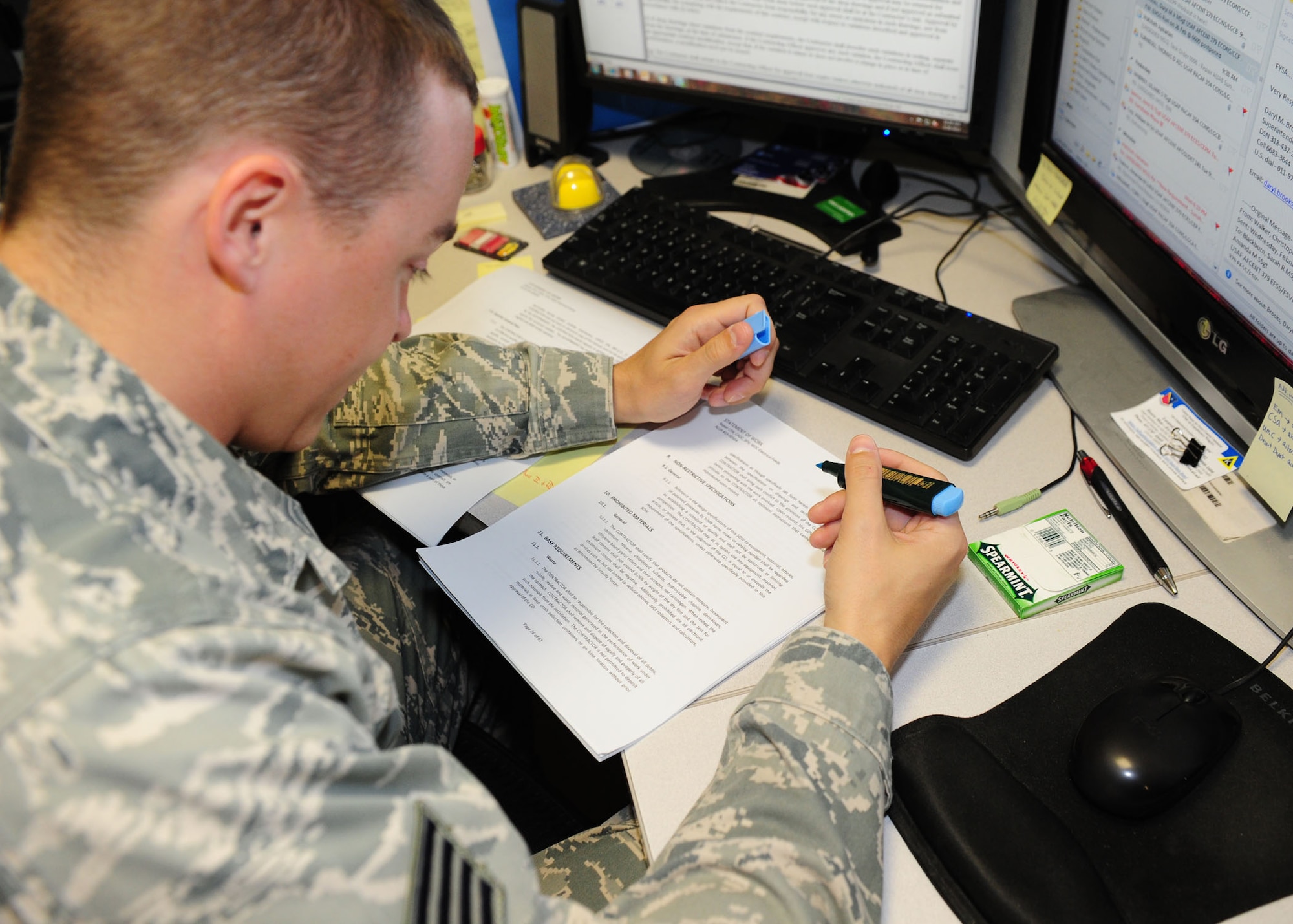 SOUTHWEST ASIA -- Staff Sgt. Cory Williams, a contracting officer with the 379th Expeditionary Contracting Squadron, Construction Flight, reviews a statement of work provided by a customer, outlines contractor requirements prior to approval by contracting.  379th contracting officers are unique because they deploy with a contingency warrant allowing them to act on and obligate on the U.S. government's behalf. (U.S. Air Force photo/ Master Sgt. Brendan Kavanaugh)