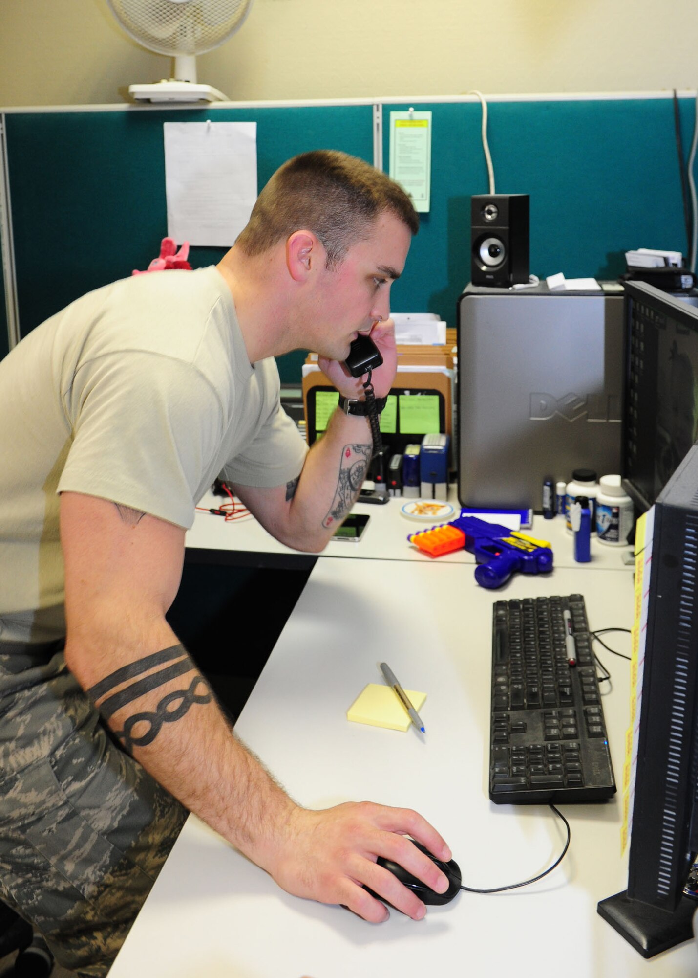 SOUTHWEST ASIA -- Staff Sgt. Ryan Alfieri, a contracting officer with the 379th Expeditionary Contracting Squadron, Base Support Flight, works talks with a local area company to purchase supplies that suddenly become mission critical. Contracting officers can secure vital purchases, normally taking weeks, in hours ensuring mission success. (U.S. Air Force photo/ Master Sgt. Brendan Kavanaugh)