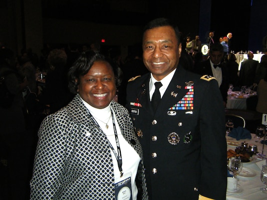 Lt. Gen. Thomas P. Bostick, chief of engineers, U.S. Army Corps of Engineers, congratulates Kimberly M. Spicer, Nashville District civil engineer and negotiator, on being named a modern day technology leader during the 27th Annual Black Engineer of the Year Award STEM Global Competitiveness Conference Feb. 8, 2013 in Washington D.C.