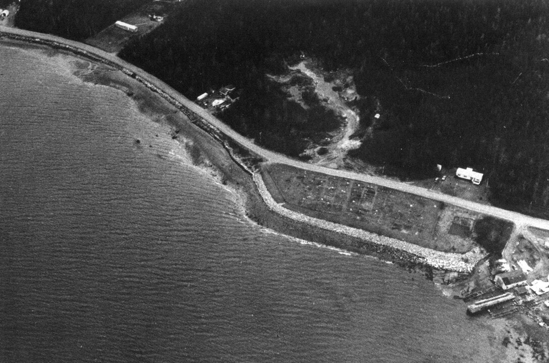 Aerial view of The Alley Bay project. The Alley Bay project lies on the northeastern shore of Beak Island in Beals, adjacent to Alley Bay, off the coast of "Downeast Maine" opposite Jonesport. Beals Island is approximately 40 miles southwest of Eastport.
