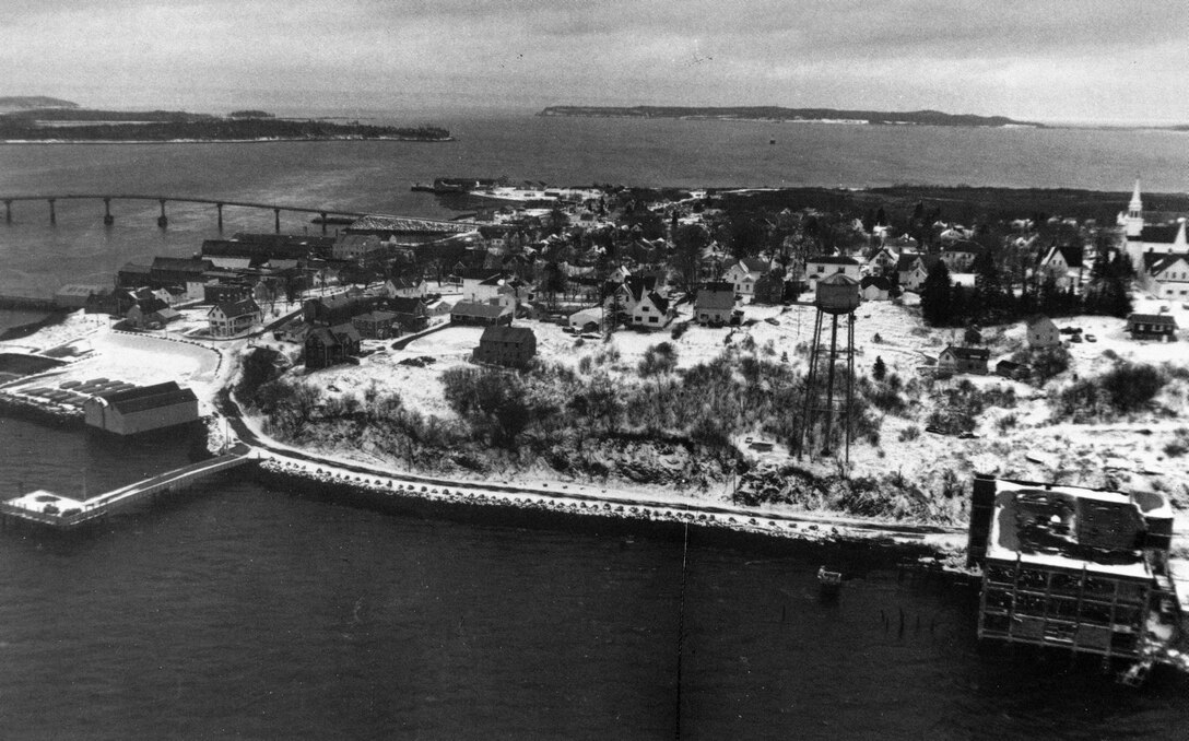 Aerial view of Johnson Bay. Johnson Bay in Lubec is part of the international channel that lies along the boundary between the United States and Canada. Lubec, the easternmost community in the United States, is located about two miles south of Eastport and 25 miles southeast of Calais. The project is located along the shore of Johnson Bay on the north side of Commercial Street at the northern tip of Lubec Neck, ME.