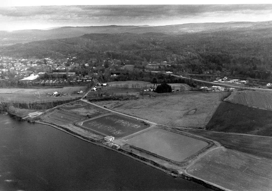 Aerial view of Charlestown Shore and Bank Protection . The project in Charlestown is located along the Connecticut River, which comprises the New Hampshire-Vermont border. Charlestown is about 25 miles north of Keene, NH.  Photograph was taken in Dec. 1988.