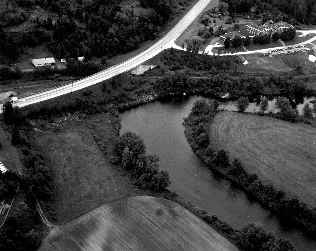 Aerial view of West Stewartstown Shore and Bank Protection. This project, located in the West Stewartstown section of Stewartstown, is situated along the Connecticut River in the northwest corner of the state, near New Hampshire's border with Canada and Vermont. It is about 150 miles north of Concord, NH.  Photo was taken in June 1989.