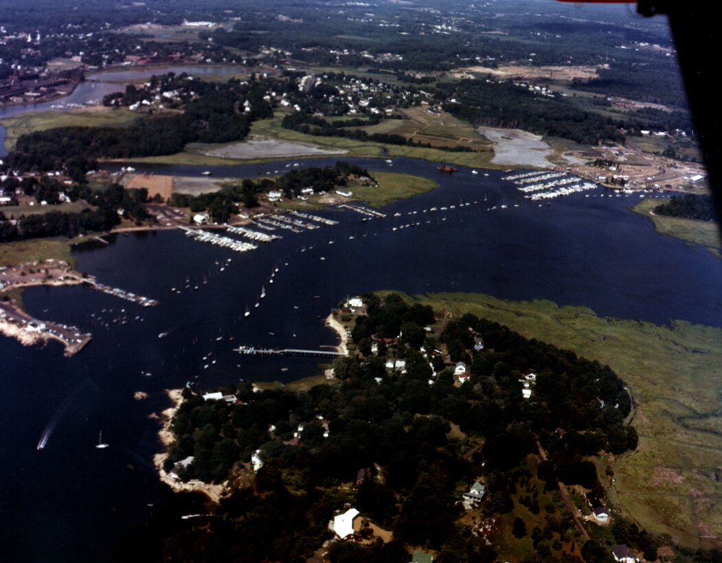 Aerial view of Branford Harbor. Branford Harbor lies at the mouth of the Branford River in southwestern Branford, CT. The harbor is used chiefly for recreational boating. 