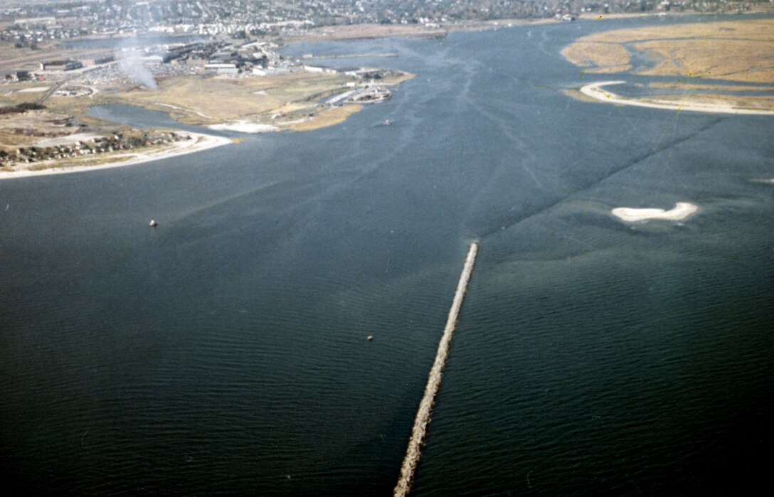 Aerial view of Housatonic River. The Housatonic River originates in northwestern Massachusetts and flows south for 132 miles through Massachusetts and Connecticut to Long Island Sound at Stratford, about four miles east of Bridgeport Harbor.  Photo was taken in Oct. 1967.
