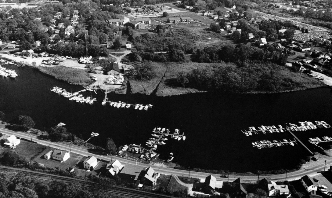 Aerial view of Pawcatuck River. The Pawcatuck River flows through the east side of the Pawcatuck section of Stonington into Little Narragansett Bay at the Rhode Island-Connecticut state line. 