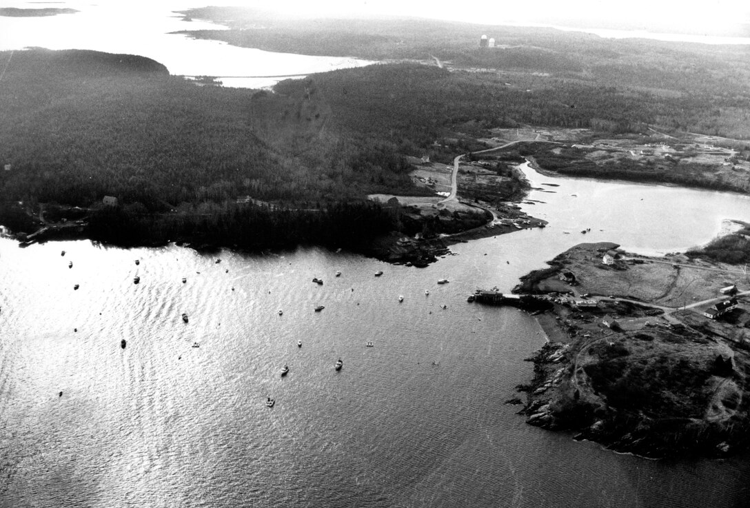 Aerial view of Bucks Harbor. Bucks Harbor is located in Machiasport on Machias Bay, about 25 miles southwest of Eastport, photograph taken  Dec. 1987.