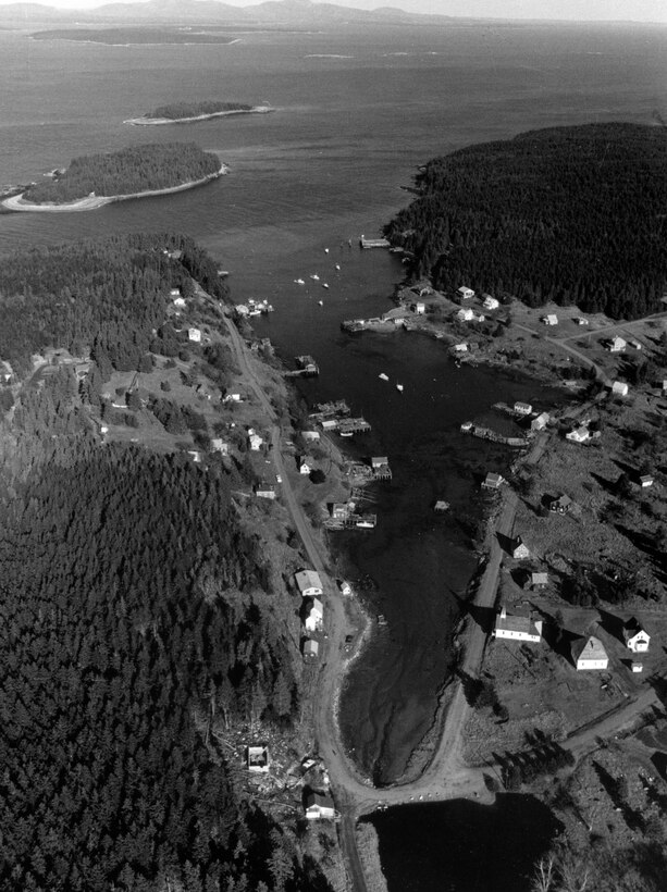Aerial view of Frenchboro Harbor. Frenchboro Harbor in Frenchboro, ME, known locally as Lunt Harbor, is a shallow, narrow cove located on the northwest side of Long Island, about 20 miles south of Bar Harbor. Photo was taken in Dec. 1987.