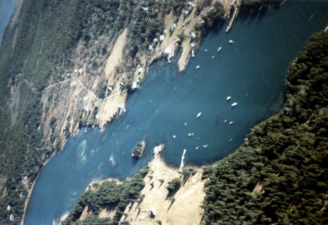 Aerial view of The Isle au Haut Thoroughfare. The Isle au Haut Thoroughfare, immediately off the Isle au Haut coast, is a navigational passage between Isle au Haut and Kimball Island. Isle au Haut is located on the outskirts of Penobscot Bay, about six miles southeast of Stonington and 25 miles east of Rockland, ME.