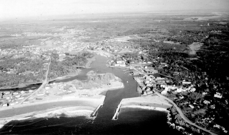 Aerial view of Kennebunk River. The Kennebunk River flows southeasterly along the border of Kennebunk and Kennebunkport, two popular summer resort communities on the coast of Maine, and empties into the Atlantic Ocean, about 30 miles southwest of Portland. Photograph taken  Dec. 1987.