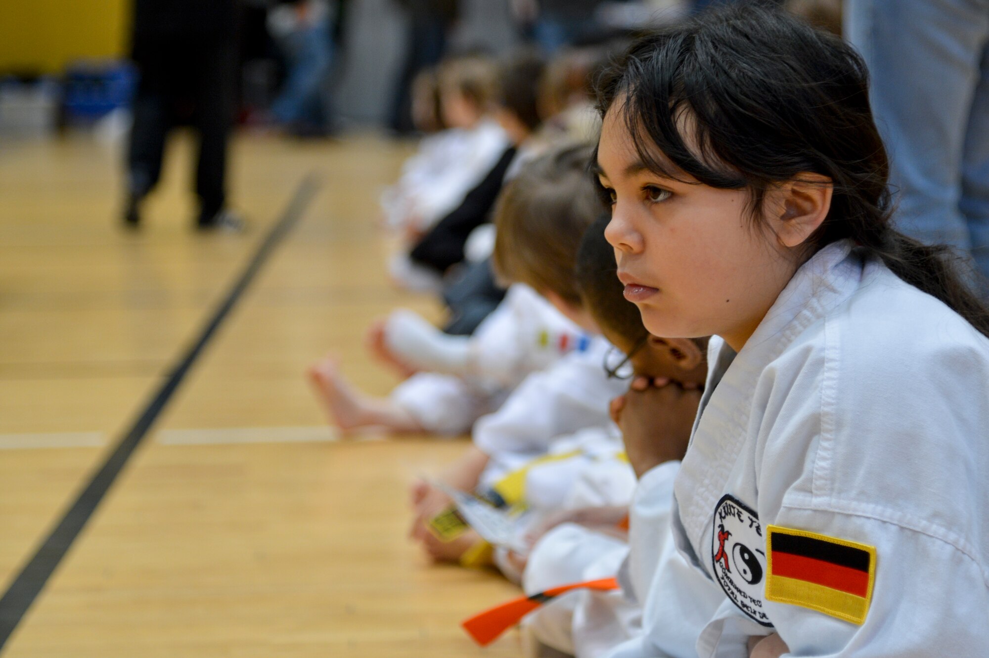 Cheyenne Guimond, 9, daughter of Staff Sgt. Damian Guimond, 86th Vehicle Readiness Squadron automotive technician, waits to compete in the 13th annual U.S. Air Forces in Europe and Air Forces Africa Martial Arts Tournament on Ramstein Air Base, Germany, Feb. 23, 2013. The USAFE-AFAFRICA Martial Arts Tournament is a way for all participants ages 3 to 18 to test their martial art skills against their peers. (U.S. Air Force photo/Airman 1st Class Jordan Castelan)