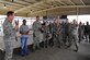 Lt. Col. Scott Adams, 386th Air Expeditionary Wing, Chaplain talks to deployed service members at 'The Rock' pavilion during the chapel sponsored National Prayer Luncheon Feb. 23, 2013. The National Prayer Breakfast is a yearly event for politicians, businessmen and leaders in Washington D.C to get together and pray for the President and his family. (U.S. Air Force photo by Staff Sgt. Austin Knox)