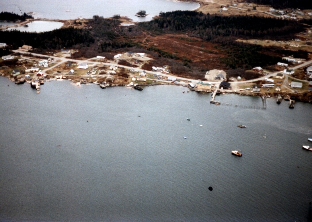 Aerial view of Pig Island Gut. Pig Island Gut in Beals is the narrow passage between Pig Island and Great Wass Island, about one mile southeast of Jonesport and 30 miles east of Bar Harbor, ME.