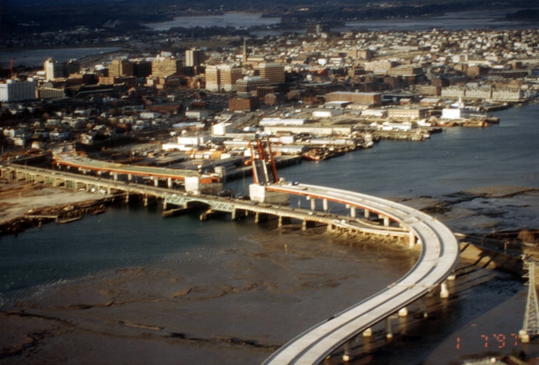 Aerial view of Portsmouth Harbor. Portsmouth Harbor is located on the Piscataqua River, which makes up a portion of the Maine-New Hampshire border. Portsmouth Harbor stretches across the communities of Kittery and Eliot, Maine, and Portsmouth, Newington, and New Castle, New Hampshire. Photo was taken in Jan. 1997.